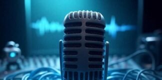 AI Audio Enhancer: Instantly Fix Bad Recordings & Sound Like a Pro! Alt text: A glowing vintage microphone half-submerged in digital blue light, surrounded by tangled audio cables forming a heart shape, with a faint soundwave in the background. A tiny cartoon robot adjusts a mixing board, set against a dreamy, blurred backdrop with neon teal, dusty coral, and midnight blue tones. Caption: “The magic of AI audio enhancers, turning chaos into clarity.”