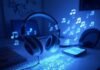 Auto-Tune Your Voice Like a Star Using AI Apps Messy Brooklyn desk with glowing smartphone, retro headphones, cheap mic, and pixelated musical notes in a blue-lavender-charcoal palette.
