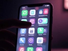 Fake Icons: The Clever Way to Hide Sensitive Content on Your Phone A slightly blurred phone screen with fake and real app icons, a nervous hand shadow, and tiny pixelated padlocks, featuring a muted neon palette of pinks, greens, and purples on a dark charcoal background, evoking a secretive yet hopeful vibe in a dimly lit coffee shop.