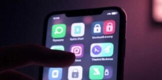 Fake Icons: The Clever Way to Hide Sensitive Content on Your Phone A slightly blurred phone screen with fake and real app icons, a nervous hand shadow, and tiny pixelated padlocks, featuring a muted neon palette of pinks, greens, and purples on a dark charcoal background, evoking a secretive yet hopeful vibe in a dimly lit coffee shop.